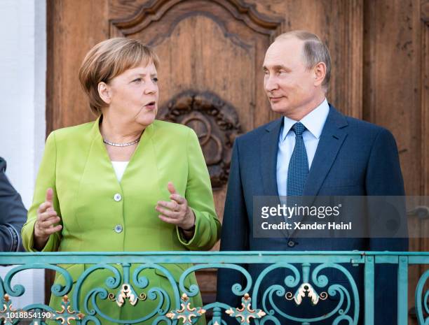 German Chancellor and leader of the German Christian Democrats Angela Merkel welcomes the Russian President, Vladimir Putin, at Schloss Meseberg...