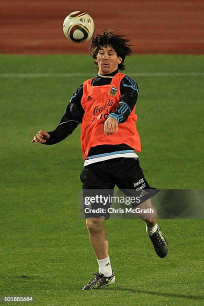 Lionel Messi of Argentina's national football controls the ball during a team training session on June 8, 2010 in Pretoria, South Africa.