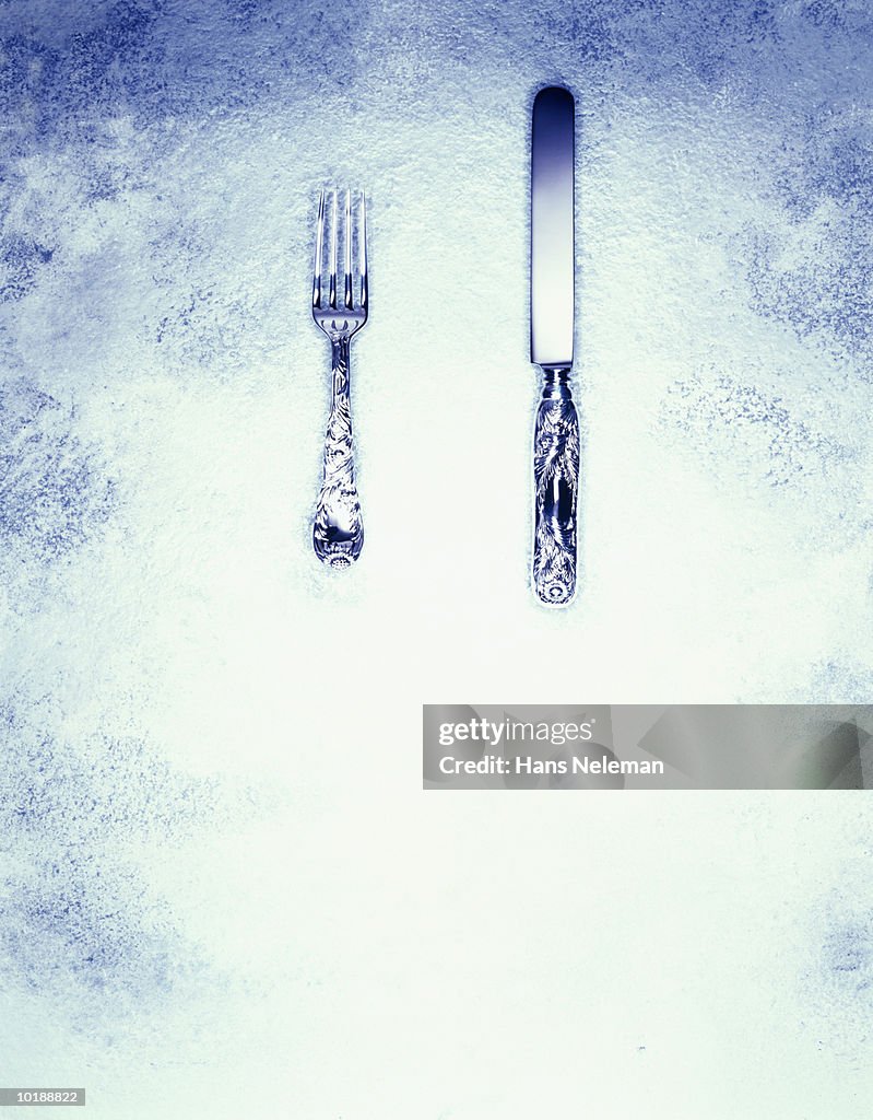 Ornate silver fork and knife