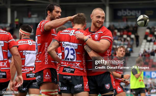 Gloucester players celebrates scoring the last try during the pre-season friendly match at the Kingspan Stadium, Belfast.