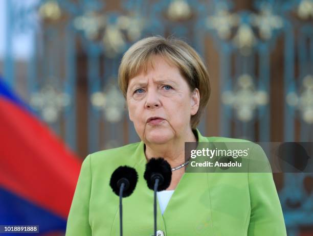German Chancellor Angela Merkel and Russian President Vladimir Putin hold a press conference ahead of their meeting at Meseberg Palace in Gransee...