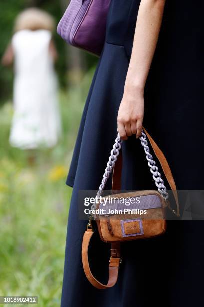 Model, fashion detail, poses at the Cala Jade show during Oslo Runway SS19 at Vannspeilet on August 14, 2018 in Oslo, Norway.