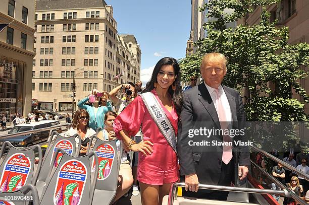 Miss USA Rima Fakih and estate mogul Donald Trump attend Donald Trump's Gray Line New York's Ride of Fame campaign dedication at front of Trump Tower...