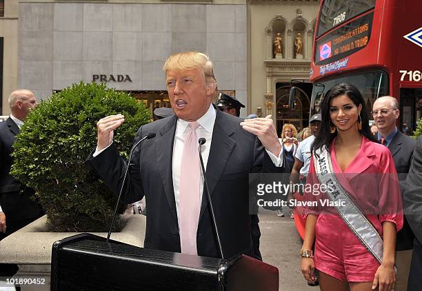 Estate mogul Donald Trump and Miss USA Rima Fakih attend Donald Trump's Gray Line New York's Ride of Fame campaign dedication at front of Trump Tower...