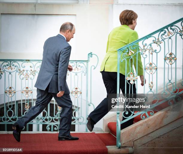 German Chancellor and leader of the German Christian Democrats Angela Merkel welcomes the Russian President, Vladimir Putin, at Schloss Meseberg...