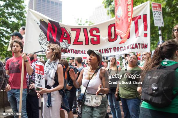 Counter protesters chant during the rally organized by Boston Free Speech at City Hall Plaza on August 18, 2018 in Boston, Massachusetts.