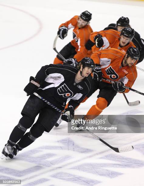 Chris Pronger of the Philadelphia Flyers leads teammates in a skating drill during practice for the 2010 NHL Stanley Cup Final at Wachovia Center on...