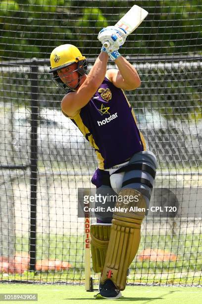 In this handout image provided by CPL T20, Chris Lynn takes part in a Trinbago Knight Riders nets and training session at Central Broward Regional...