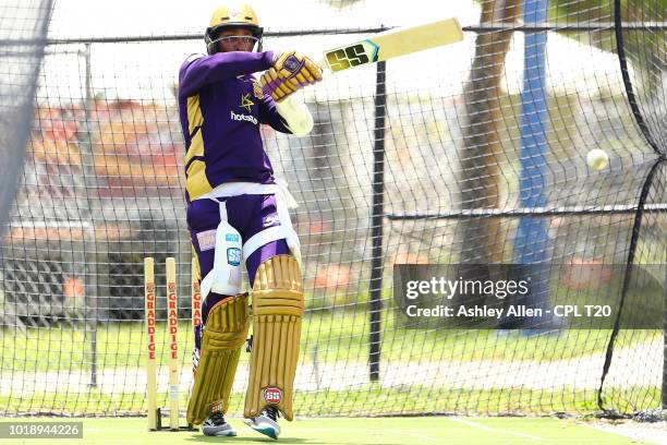 In this handout image provided by CPL T20, Denesh Ramdin bats during a Trinbago Knight Riders nets and training session at Central Broward Regional...