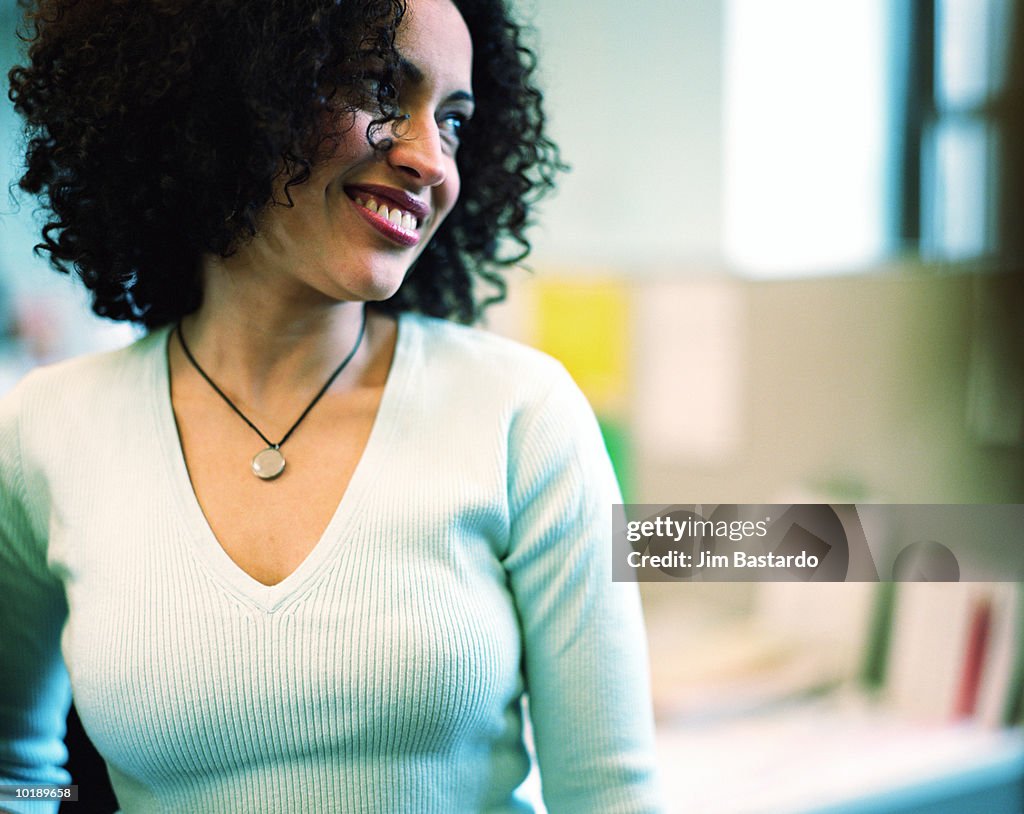 Casual businesswoman smiling, portrait, close-up