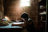 Brazilian boy studying at home