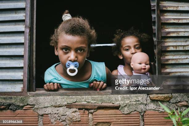 brazilian children at the window - the project portraits stock pictures, royalty-free photos & images