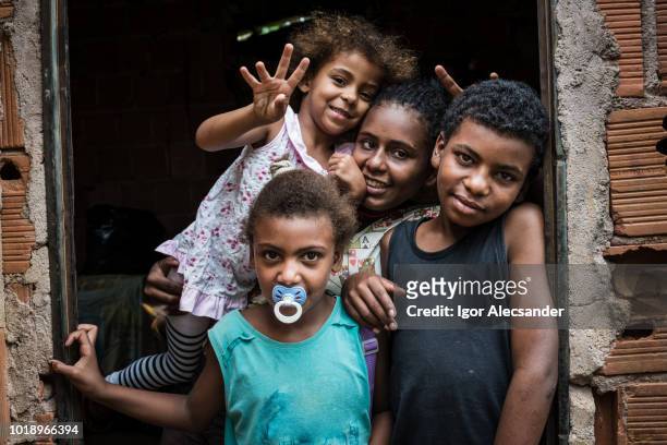 brazilian children at home, rio de janeiro state - slum stock pictures, royalty-free photos & images