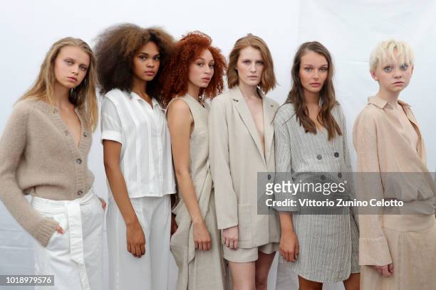 Models are seen backstage ahead of the Iben show during Oslo Runway SS19 at Prindsen Hage on August 14, 2018 in Oslo, Norway.