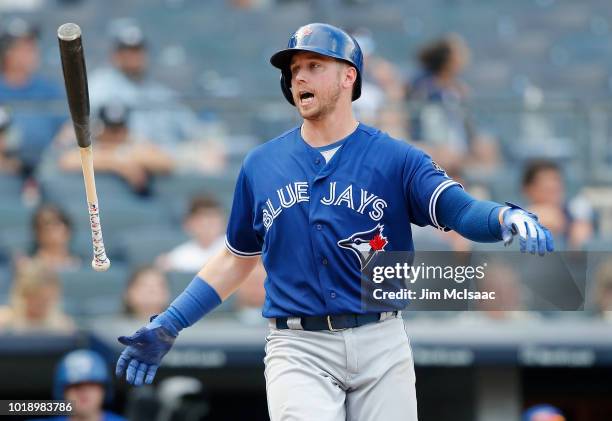 Justin Smoak of the Toronto Blue Jays reacts after striking out in the ninth inning against the New York Yankees at Yankee Stadium on August 18, 2018...