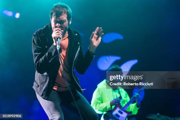 Tom Meighan and Sergio Pizzorno of Kasabian perform on stage at Princes Street Gardens during Edinburgh Summer Sessions on August 18, 2018 in...