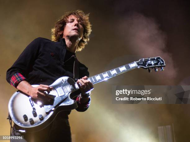 Touring guitarist Tim Carter of Kasabian performs on stage at Princes Street Gardens during Edinburgh Summer Sessions on August 18, 2018 in...