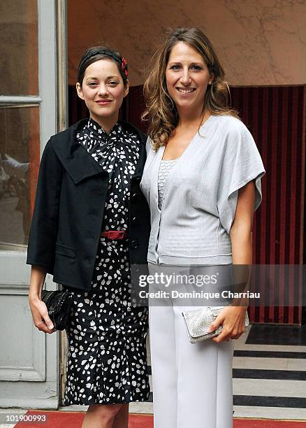 Actress Marion Cotillard poses With Maud Fontenoy as she arrives at the Soiree de gala Maud Fontenoy Fondation at Hotel de la Marine on June 8, 2010...