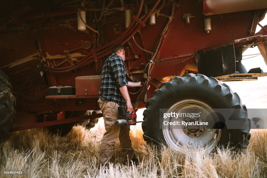 Combine Harvester Working Idaho Wheat Field