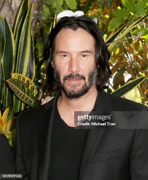 Keanu Reeves attends the photo call for Regatta's "Destination Wedding" held at Four Seasons Hotel Los Angeles at Beverly Hills on August 18, 2018 in...