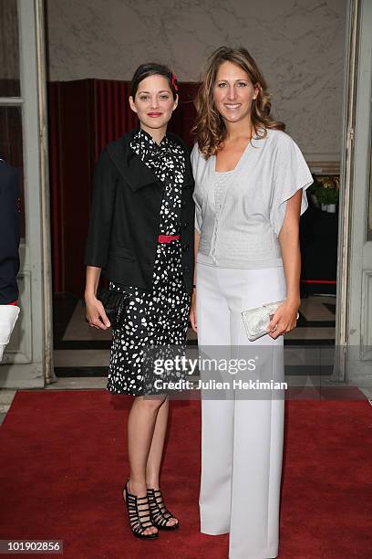 French actress Marion Cotillard and Maud Fontenoy attend the Maud Fontenoy's gala at Hotel de la Marine on June 8, 2010 in Paris, France.