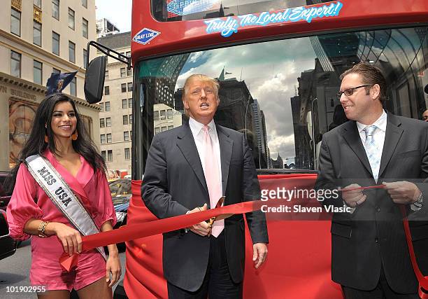Miss USA Rima Fakih and estate mogul Donald Trump attend Donald Trump's Gray Line New York's Ride of Fame campaign dedication at front of Trump Tower...
