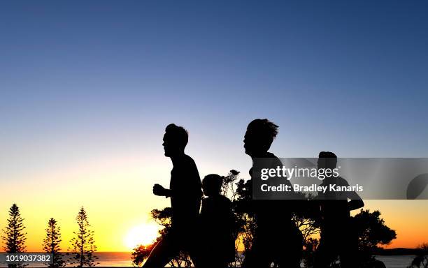 Jack Rayner, Collis Birmingham, Nicolas Harman and Kevin Batt compete during the Sunshine Coast Half Marathon on August 19, 2018 in Sunshine Coast,...