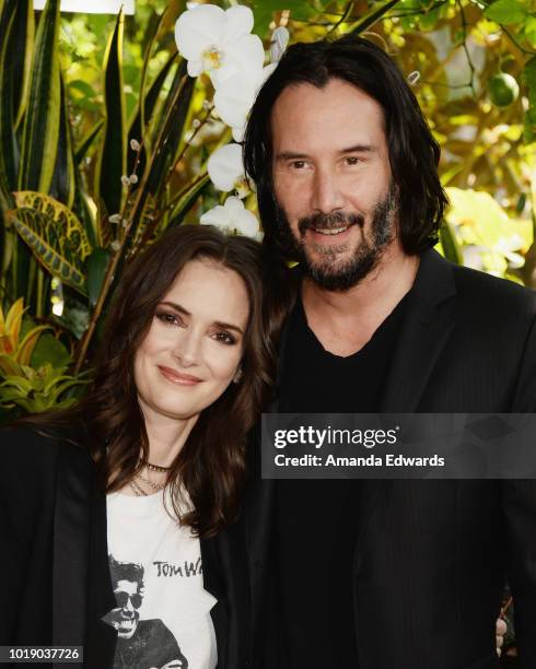 Actress Winona Ryder and actor Keanu Reeves attend a photo call for Regatta's "Destination Wedding" at the Four Seasons Hotel Los Angeles at Beverly...