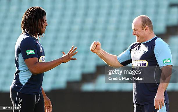 Jamal Idris and Michael Weyman of the Blues play paper-scissors-rock during a New South Wales Blues Origin training session at Parramatta Stadium on...