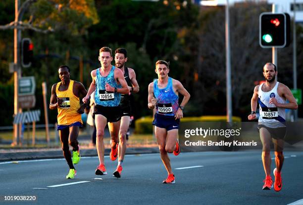 Jack Rayner, Collis Birmingham, Nicolas Harman and Kevin Batt compete during the Sunshine Coast Half Marathon on August 19, 2018 in Sunshine Coast,...