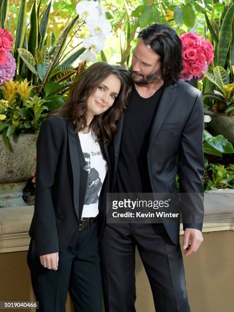 Winona Ryder and Keanu Reeves attend a photo call for Regatta's "Destination Wedding" at the Four Seasons Hotel Los Angeles at Beverly Hills on...