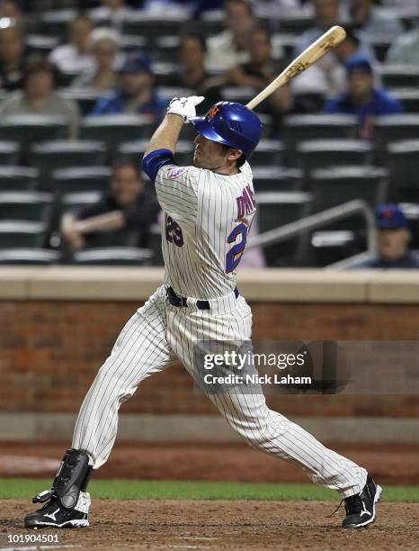 Ike Davis of the New York Mets hits a solo home run in the eleventh inning to win the game against the San Diego Padres on June 8, 2010 in the...