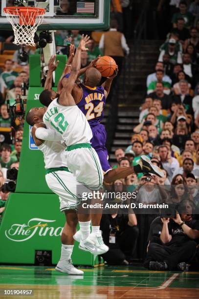 Kobe Bryant of the Los Angeles Lakers shoots against Tony Allen and Glen Davis of the Boston Celtics in Game Three of the 2010 NBA Finals on June 8,...