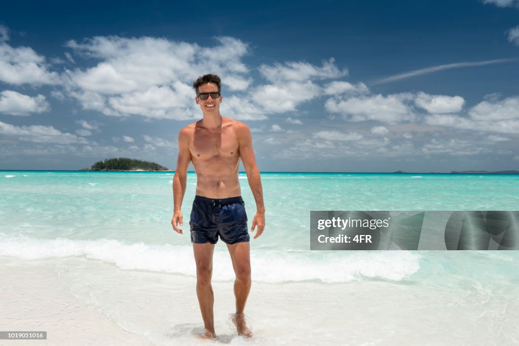 Man at the White Sand Beach, Whitsunday Islands, Queensland, Australia