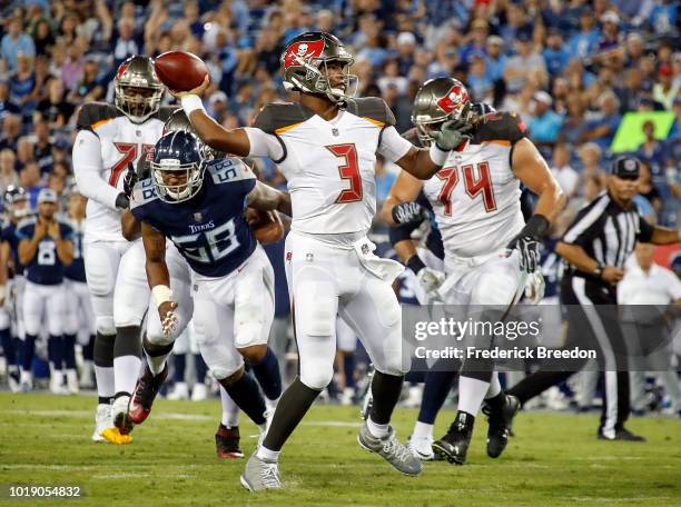 Quarterback Jameis Winston of the Tampa Bay Buccaneers drops back to pass against the Tennessee Titans during the first half of a preseason game at...