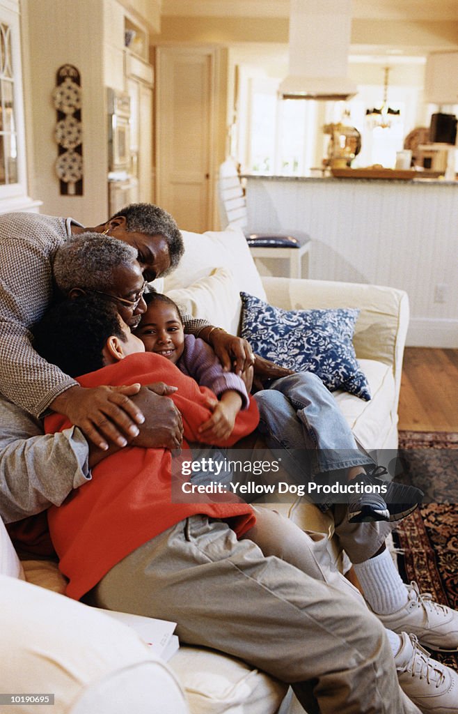 Grandparents hugging grandchildren (7-12)