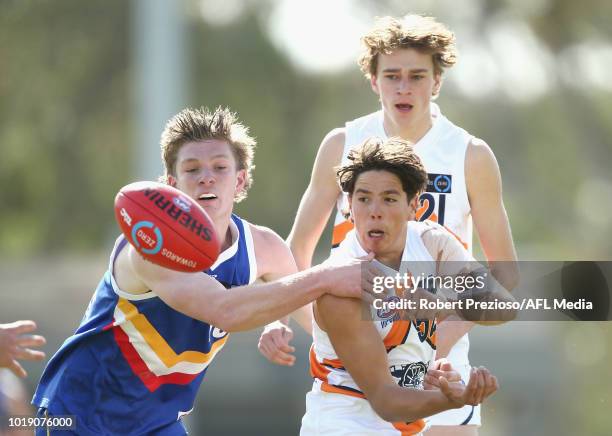 Benjamin Reddick of Calder Cannons handballs during the TAC Cup round 15 match between Eastern Ranges and Calder Cannons at Avalon Airport Oval on...