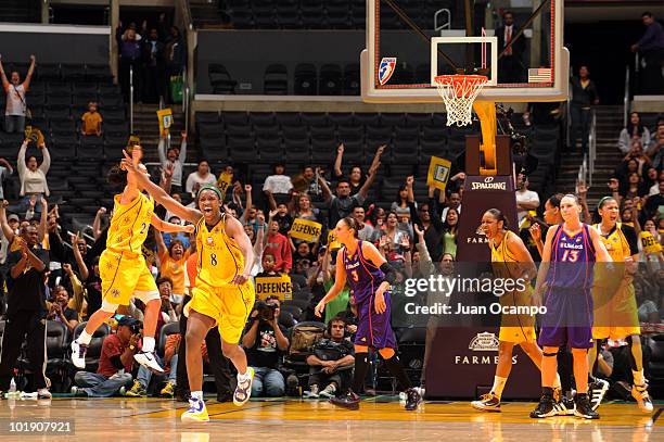 DeLisha Milton-Jones of the Los Angeles Sparks celebrates the Sparks' 92-91 win over the Phoenix Mercury on June 8, 2010 at Staples Center in Los...
