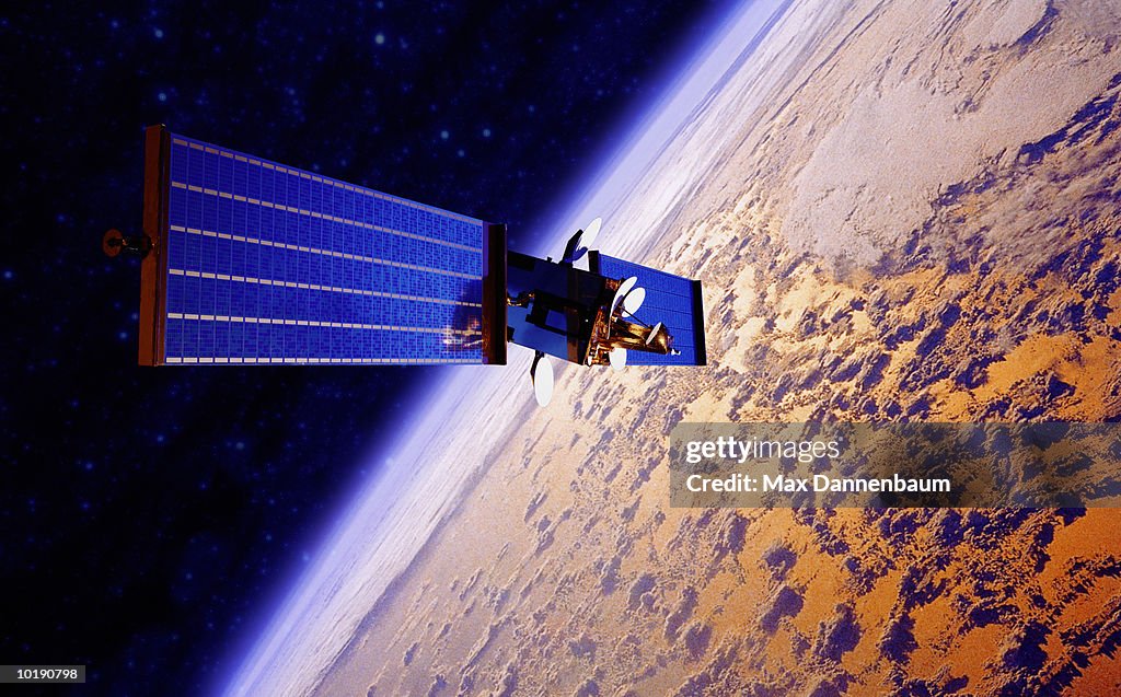 Communication Satellite orbiting planet (Digital composite)