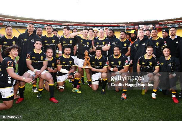 Thomas Waldrom of Wellington holds the Mike Gibson Memorial Trophy after winning the round one Mitre 10 Cup match between Wellington and Otago at...