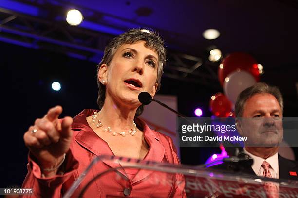 Senate candidate and former Hewlett-Packard CEO Carly Fiorina celebrates her primary win with her husband Frank Fiorina at her side at the California...