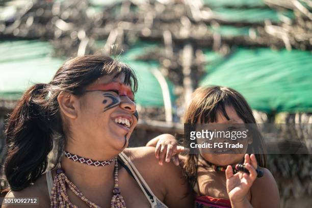 indigenous brazilian sisters, portrait from tupi guarani ethnicity - amazon jungle girls stock pictures, royalty-free photos & images