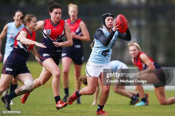 Courteney Bromage of the Blues gathers the ball during the VFLW round 15 match between Darebin and Carlton at Bill Lawry Oval on August 19, 2018 in...