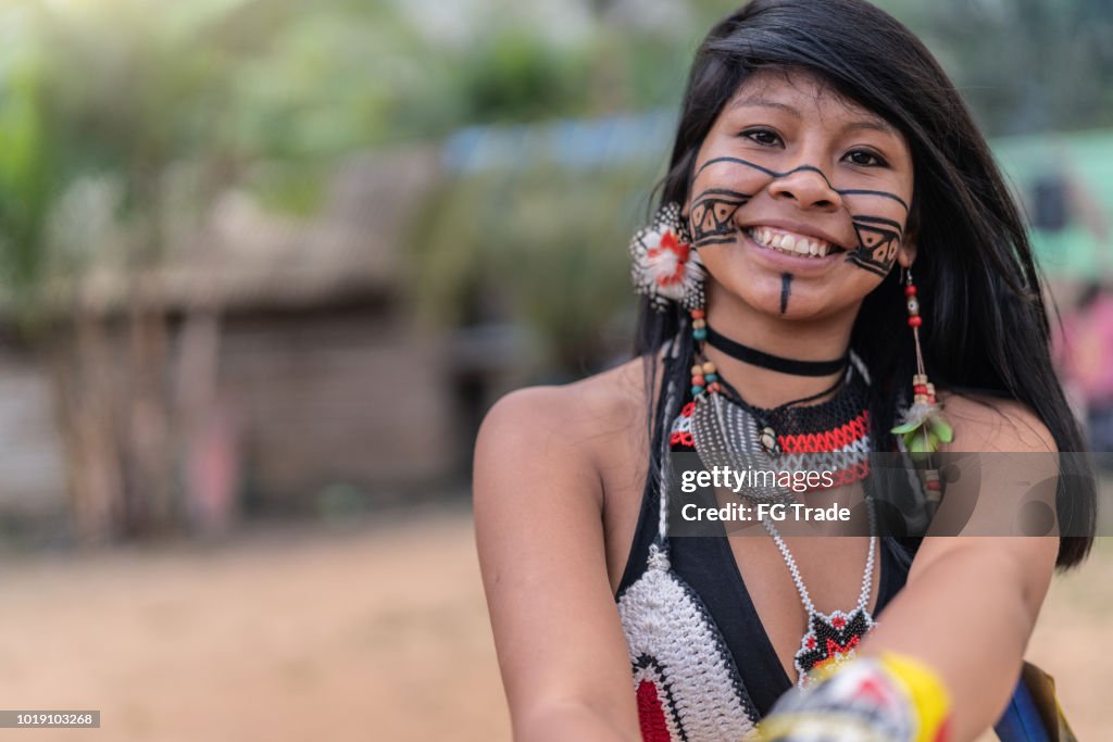 Indigenous Brazilian Young Woman, Portrait from Tupi Guarani Ethnicity, in a Hut