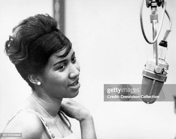 Musician Aretha Franklin recording at the piano at Columbia Studios in 1962 in New York.