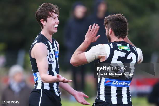 Tyler Brown of the Magpies celebrates a goal during the round 20 VFL match between Collingwood and Frankston at Victoria Park on August 19, 2018 in...
