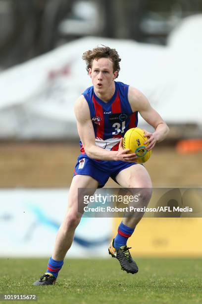 William Golds of Oakleigh Chargers runs during the TAC Cup round 15 match between Oakleigh Chargers and Sandringham Dragons at Avalon Airport Oval on...
