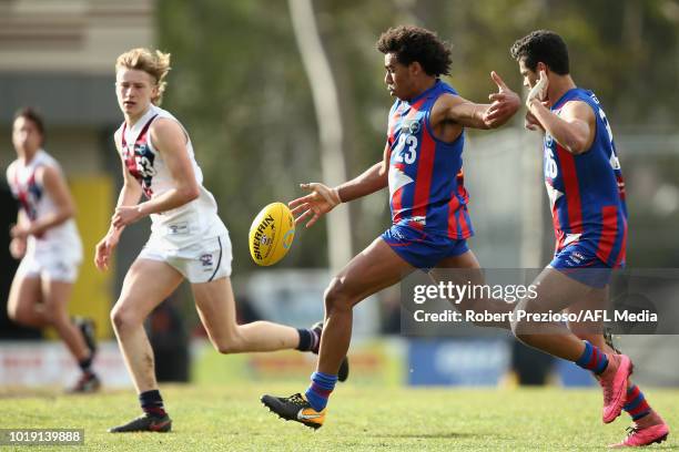 Isaac Quaynor of Oakleigh Chargers kicks during the TAC Cup round 15 match between Oakleigh Chargers and Sandringham Dragons at Avalon Airport Oval...