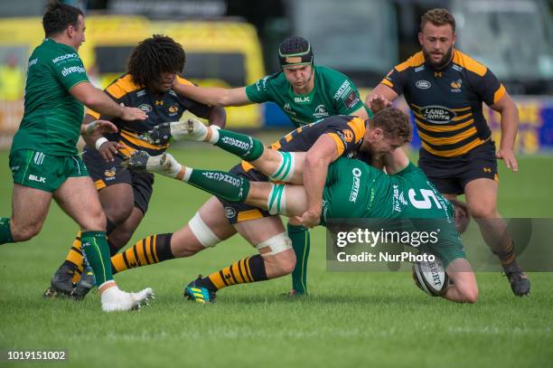 James Cannon of Connacht felled by Will Rowlands of Wasps during the Pre Season friendly match between Connacht Rugby and Wasps at Dubarry Park in...