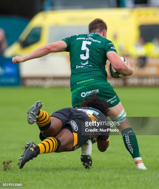 James Cannon of Wasps tackled by Ashley Johnson of Wasps during the Pre Season friendly match between Connacht Rugby and Wasps at Dubarry Park in...